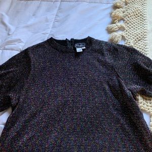 a sparkly short sleeve shirt